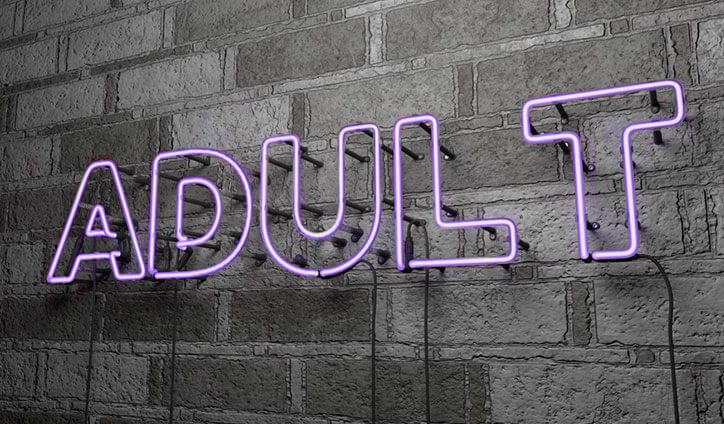 neon sign reads adult
